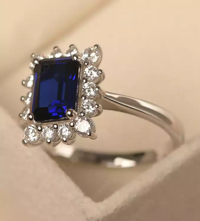 Sapphire Emerald Cut Halo Ring by LUO